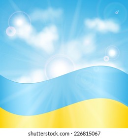 Ukrainian flag on a background of sky and sun