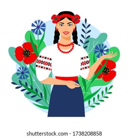 Ukrainian girl in traditional clothes on a background of leaves and flowers. Beautiful woman in an embroidered shirt