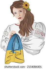 Ukrainian girl in traditional costume holding ukrainian flag