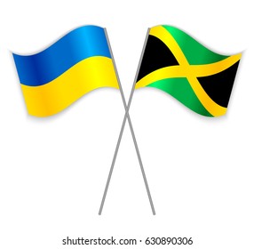 Ukrainian and Jamaican crossed flags. Ukraine combined with Jamaica isolated on white. Language learning, international business or travel concept.