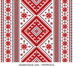 Ukrainian ornament with red and black elements on a white background 