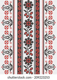 Ukrainian ornament with red and black elements on the white background