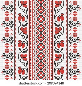Ukrainian ornament with red and black elements on the white background