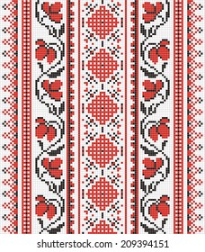 Ukrainian ornament with red and black elements on the white background