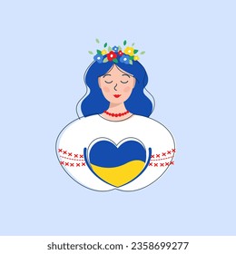 Ukrainian woman in an embroidered shirt and a traditional wreath on her head