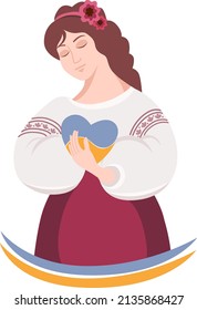 Ukrainian woman with a heart in the colors of the Ukrainian flag. Concept to stop the war in Ukraine, save Ukraine