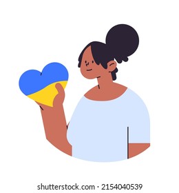 ukrainian woman holding blue yellow heart pray for Ukraine peace save Ukraine from russia stop war concept