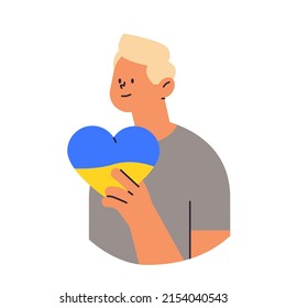 ukrainian woman holding blue yellow heart pray for Ukraine peace save Ukraine from russia stop war concept