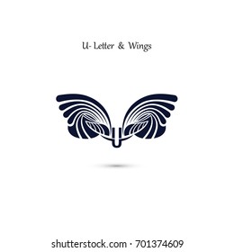 U-letter sign and angel wings.Monogram wing vector logo template.Classic emblem.Elegant dynamic alphabet letters with wings.Creative design element.Flat web design wings icon.Vector illustration.