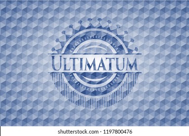 Ultimatum blue badge with geometric pattern.