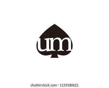 The um initials logo inside the black shovel