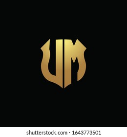 UM logo monogram with gold colors and shield shape design template