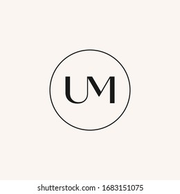 UM monogram fashion logo inside circle frame.