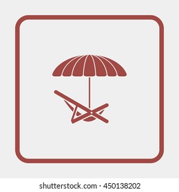 Umbrella with deck chair.