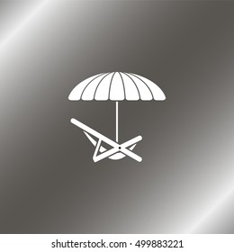 Umbrella with deck chair.