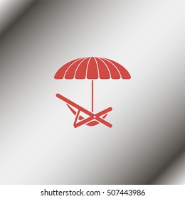 Umbrella with deck chair.
