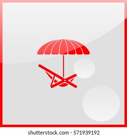Umbrella with deck chair.
