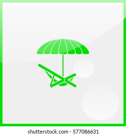 Umbrella with deck chair.