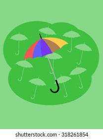 Umbrella and green background