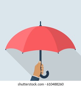 Umbrella holding in hand. Vector illustration flat design. Protection icon. Security concept. Isolated on white background.