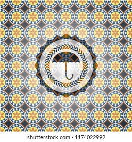 umbrella icon inside arabesque emblem background. arabic decoration.