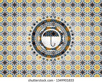 umbrella icon inside arabesque emblem background. arabic decoration.
