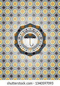 umbrella icon inside arabic badge. Arabesque decoration.
