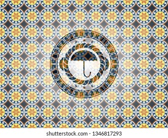 umbrella icon inside arabic badge. Arabesque decoration.
