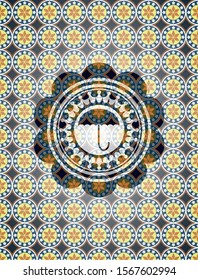 umbrella icon inside arabic badge. Arabesque decoration.