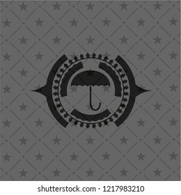 umbrella icon inside black emblem. Vintage.