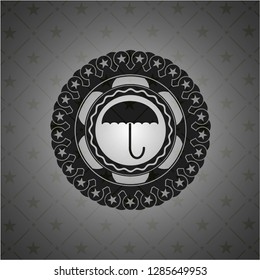 umbrella icon inside black emblem. Vintage.