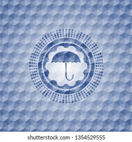 umbrella icon inside blue emblem or badge with abstract geometric polygonal pattern background.