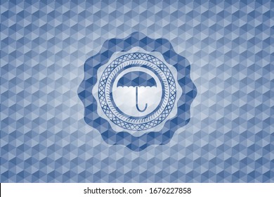icono del paraguas dentro del emblema hexagonal azul.