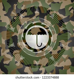 umbrella icon inside camouflage texture