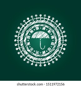 umbrella icon inside chalkboard emblem on black board