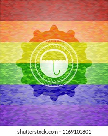 umbrella icon inside emblem on mosaic background with the colors of the LGBT flag
