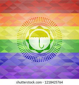 umbrella icon inside emblem on mosaic background with the colors of the LGBT flag
