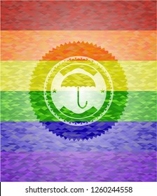 umbrella icon inside emblem on mosaic background with the colors of the LGBT flag