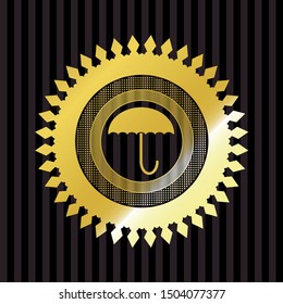 umbrella icon inside gold shiny badge