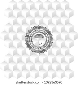 umbrella icon inside grey badge with geometric cube white background