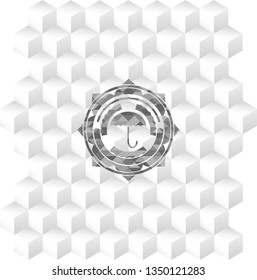 umbrella icon inside realistic grey emblem with geometric cube white background