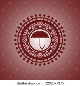 umbrella icon inside realistic red emblem