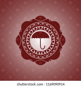 umbrella icon inside red emblem. Vintage.