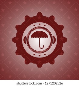 umbrella icon inside retro red emblem