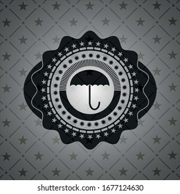icono del paraguas dentro del emblema negro estilo retro