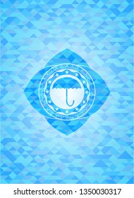 umbrella icon inside sky blue emblem with mosaic ecological style background