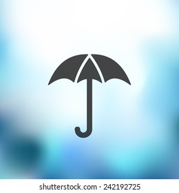 umbrella icon on blurred background