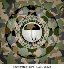 umbrella icon on camo pattern