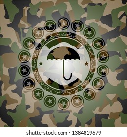 umbrella icon on camo pattern