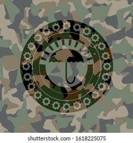 umbrella icon on camouflaged pattern